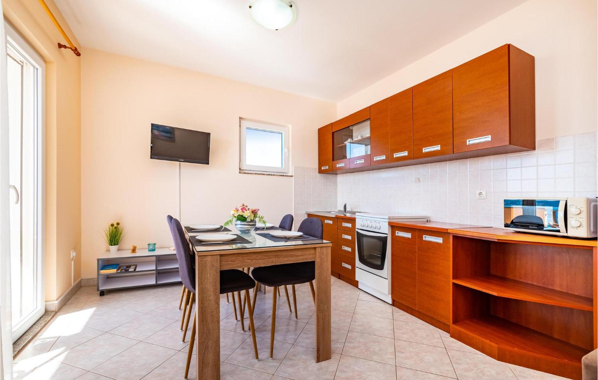 Cozy Apartment In Posedarje With House Sea View Екстер'єр фото