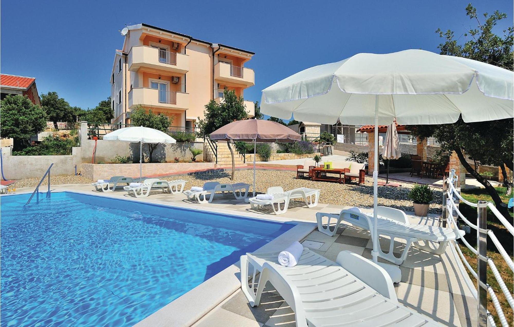 Cozy Apartment In Posedarje With House Sea View Екстер'єр фото