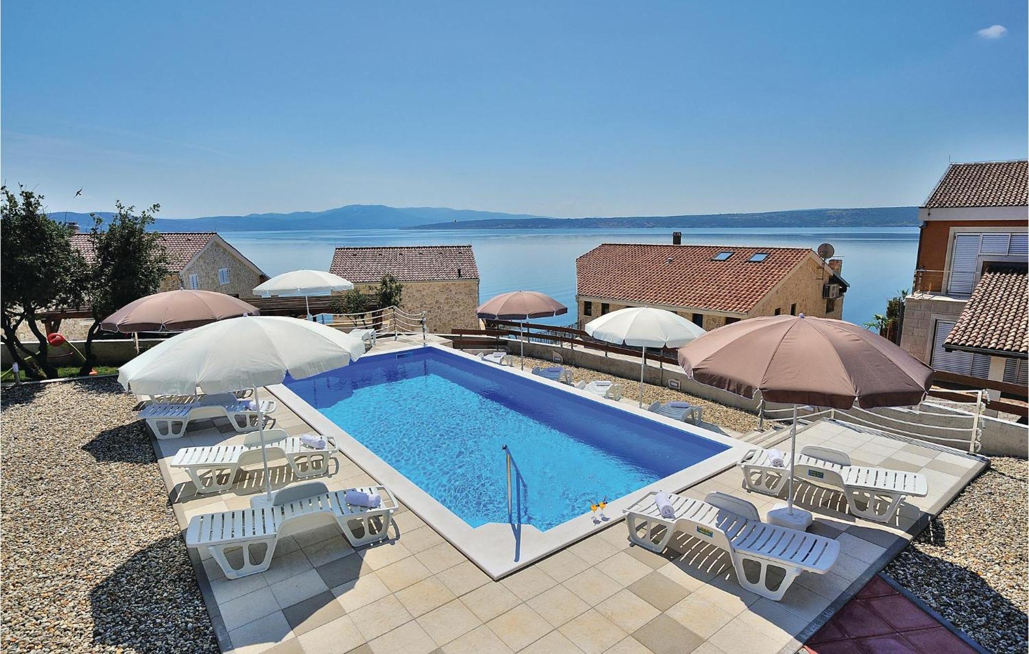 Cozy Apartment In Posedarje With House Sea View Екстер'єр фото